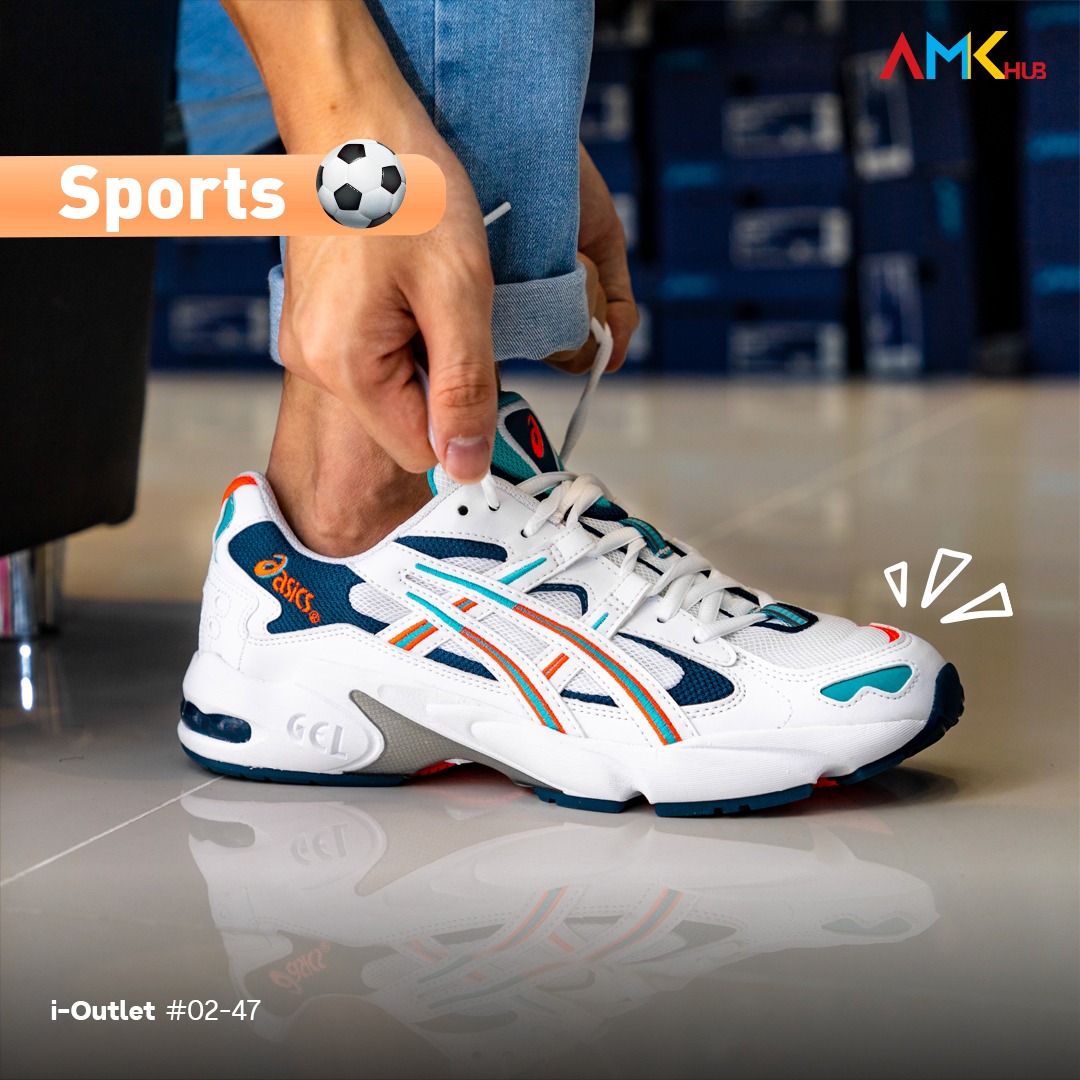 A person trying on sports shoes in a store, referencing sports apparel