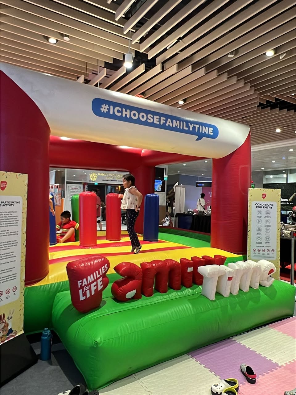 A family engaged in a fun craft activity during the Families for Life Weekend